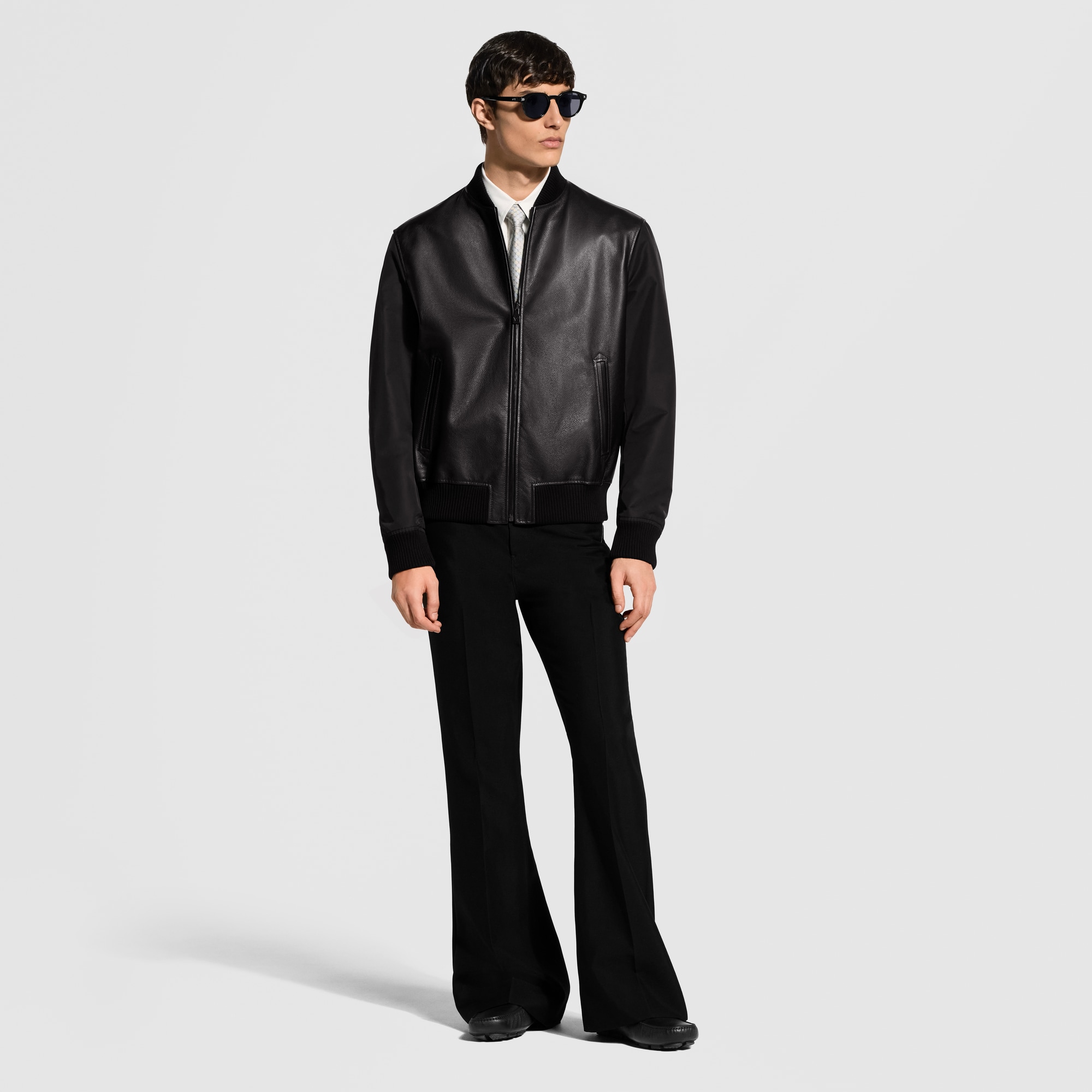Jaqueta Reversível em Nylon e Couro - High-End Ready-to-Wear